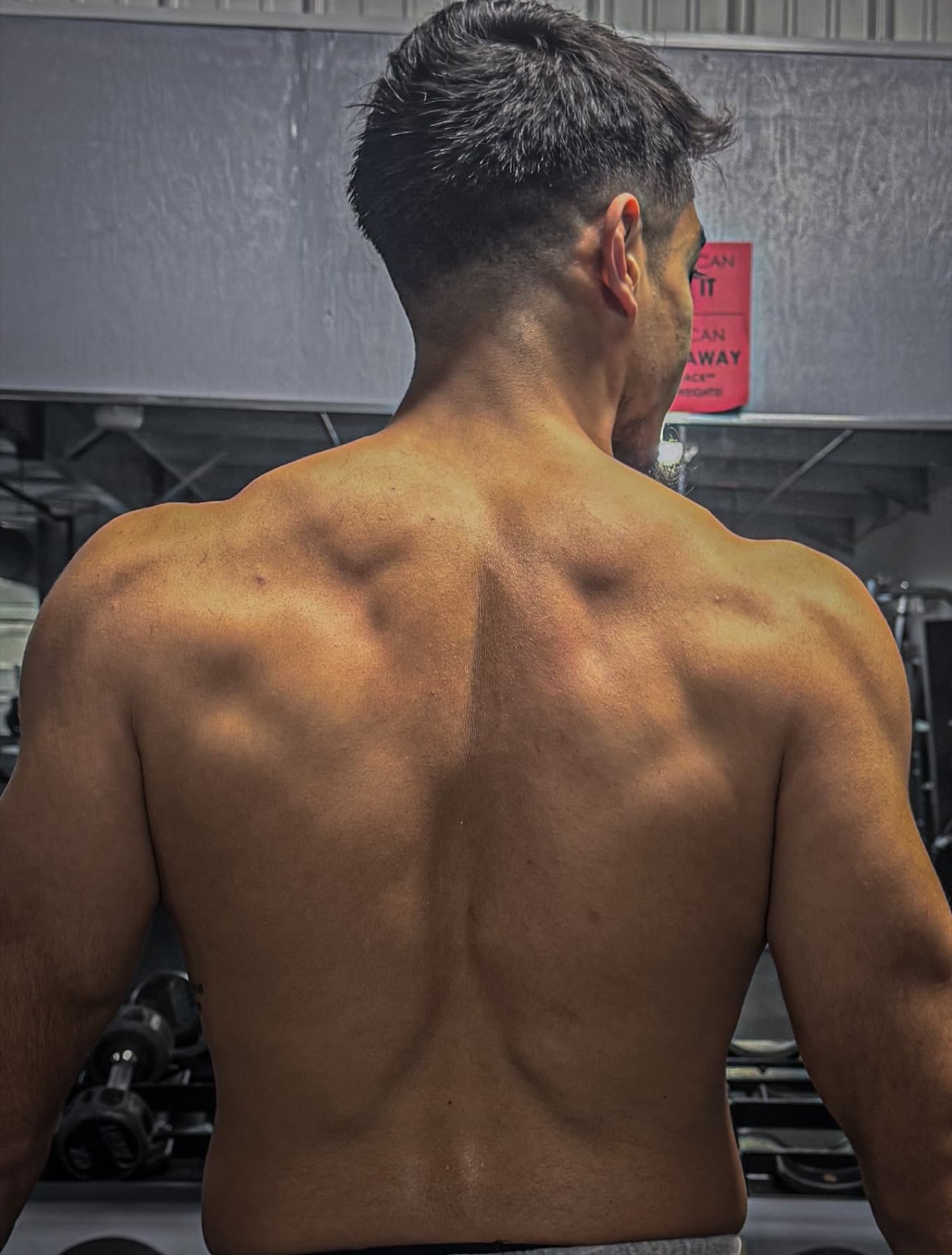 Joseles after a gym training session, photographed from behind